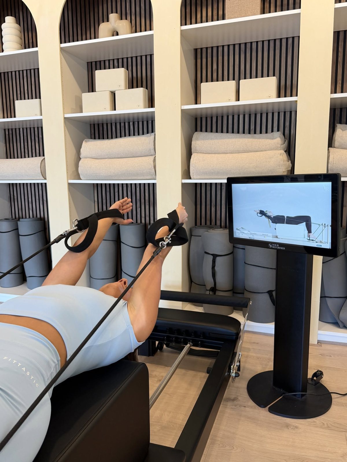 Trainen met straps op de reformer